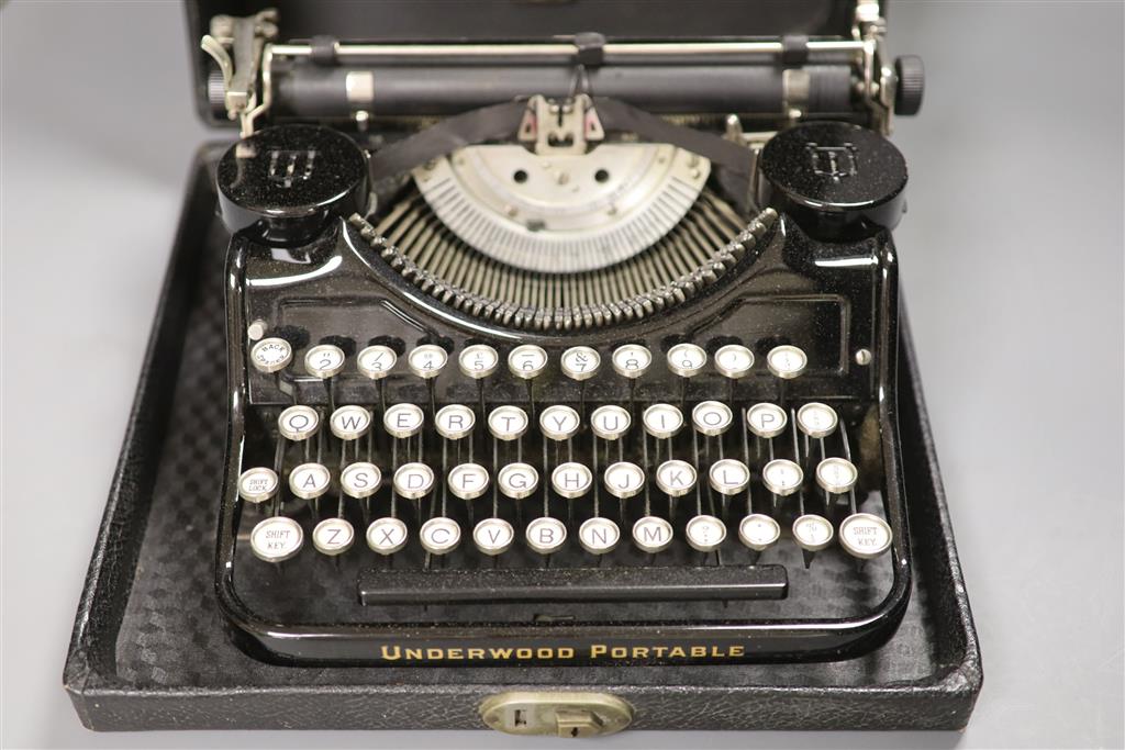 An early 20th century Underwood Elliott Fisher Ltd portable cased typewriter